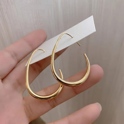 Boucles d’oreilles goutte dorées