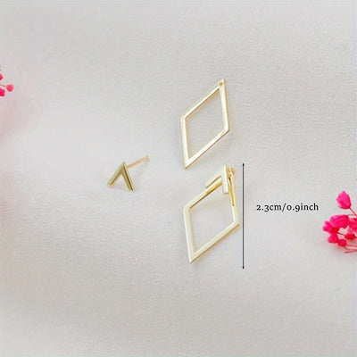 Boucles d’oreilles dorées en forme de V