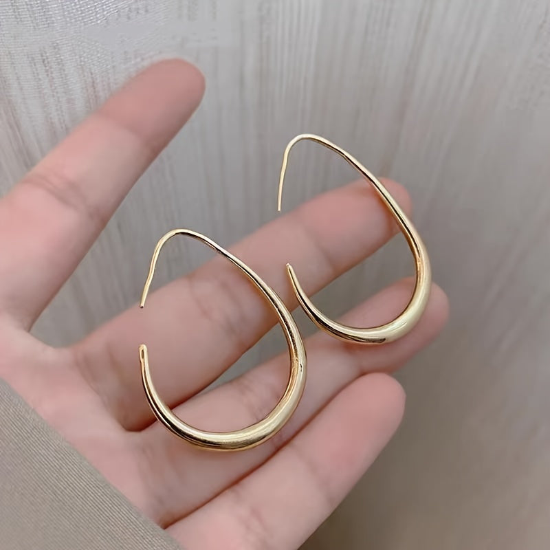 Boucles d’oreilles goutte dorées