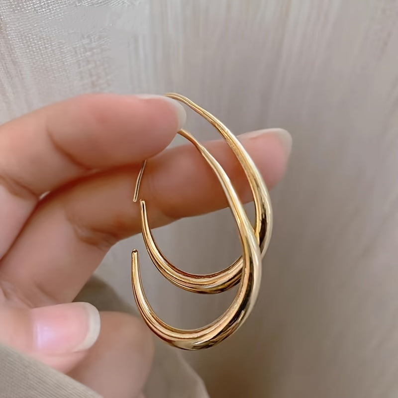 Boucles d’oreilles goutte dorées