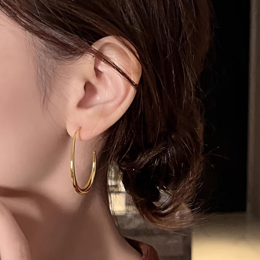 Boucles d’oreilles goutte dorées