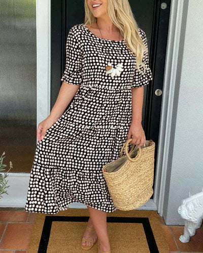 Magali | Robe midi à pois au charme rétro