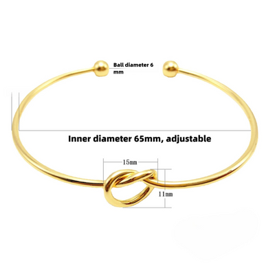 Bracelet doré avec détail nœud